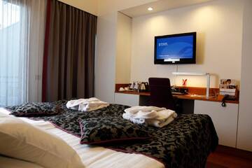 Фото номера Четырехместный номер Отель Break Sokos Hotel Vuokatti г. Вуокатти 2